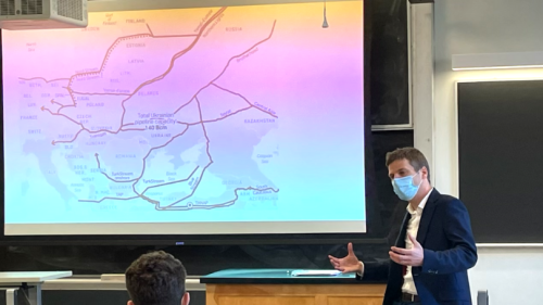 Dr. Filip Černoch in his ENVS 80.5 classroom in front of a map of Ukraine and the region