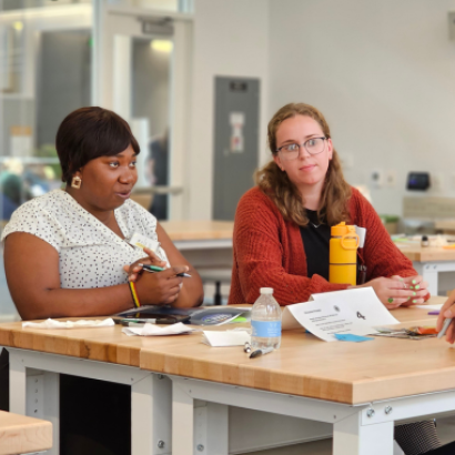 students at a table talking