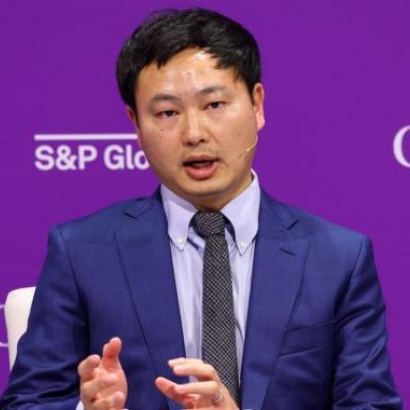 Dartmouth Professor Junbo Zhao engages in a panel discussion.