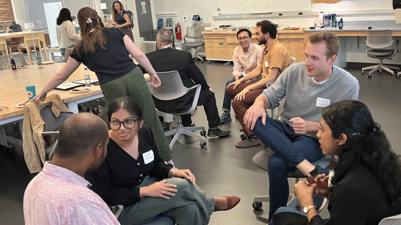 A small group of Dartmouth graduate students talking