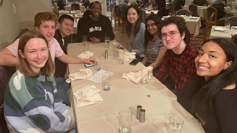 Group of students at a dinner table