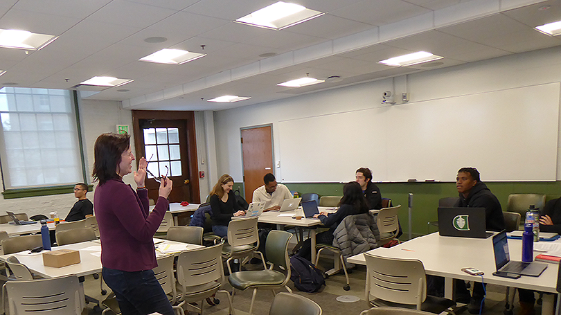 Elizabeth Wilson in a classroom with students