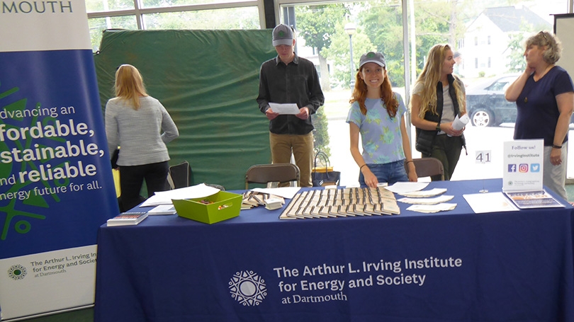 students at an info table